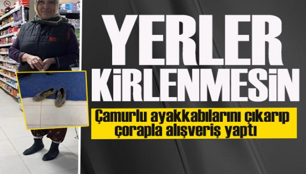 Market kirlenmesin diye... Çamurlu ayakkabılarını çıkarıp, çorapla alışveriş yaptı!