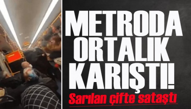 Birbirine sarılan çifte tepki gösterdi! Metroda ortalık karıştı