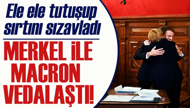 Merkel ile Macron ele ele tutuşup vedalaştılar